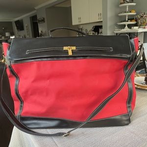 Red carry on  bag or overnight bag